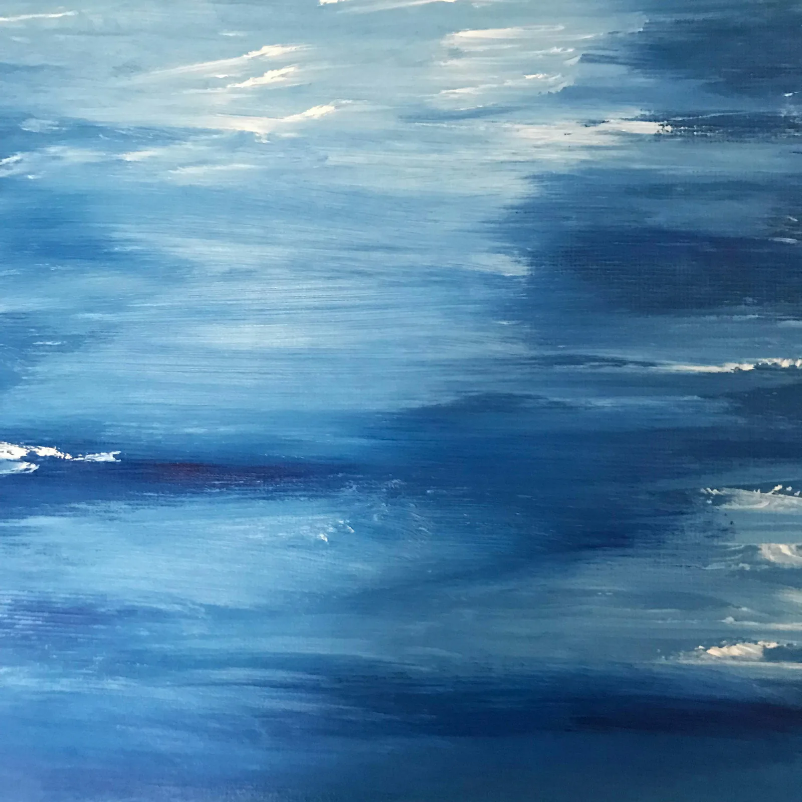 Layered blue, white, and red paint texture